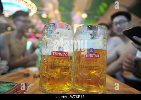 Qingdao, China's Shandong Province. 27th July, 2020. Jin Xin (R) of ...