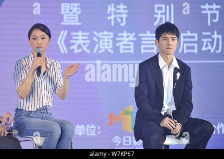 Chinese actress Zhou Xun, left, and actor Liu Haoran attend a launching event of a TV show in Beijing, China, 8 August 2017. Stock Photo