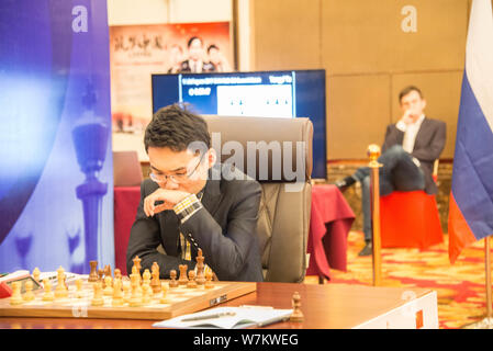 Chinese chess grandmaster Yu Yangyi competes against Russian chess grandmaster Alexander Igorevich Grischuk during the 2017 China-Russian Chess Grandm Stock Photo