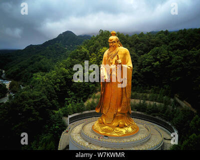 View of the statue of Lao-Tzu, also called Laozi or Lao-Tze, an ancient Chinese philosopher and the founder of Taoism, at the Laojun Mountain in Luanc Stock Photo