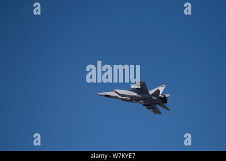 Novosibirsk, Russia - April 1, 2019: Mikoyan-Gurevich MiG-31BM Foxhound RF-92337 in the sky after take off from the international airport Tolmachevo. Stock Photo