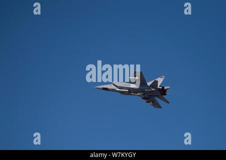 Novosibirsk, Russia - April 1, 2019: Mikoyan-Gurevich MiG-31BM Foxhound RF-92337 in the sky after take off from the international airport Tolmachevo. Stock Photo