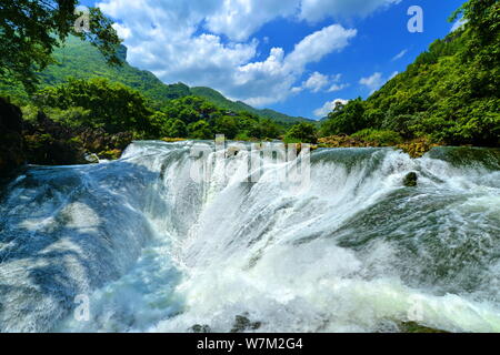 --FILE--View of the Huangguoshu Waterfall scenic spot in Anshun city, southwest China's Guizhou province, 25 July 2017. Stock Photo