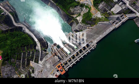 View of the Longtan hydropower station releasing water for the need of flood control along the Longtan Dam in Tian'e county, Hechi city, south China's Stock Photo