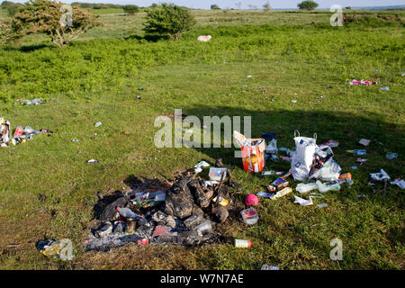 Camping rubbish strewn over common, North Gower, Wales, UK, June 2009 Stock Photo