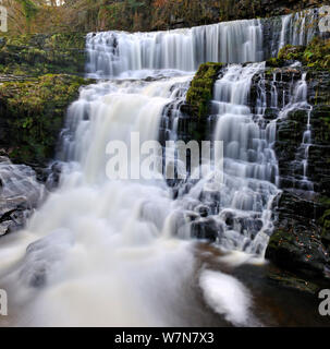 Sgwd Isaf Clun-gwyn waterfall. Ystradfellte, Brecon Beacons National Park, Wales, November 2011. Stock Photo