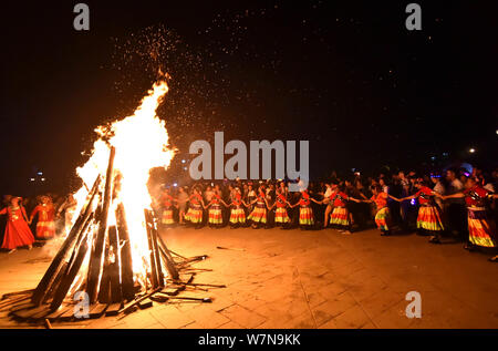 People of Yi ethnical minority gather to celebrate the Torch Festival in Dafang county, Bijie city, southwest China's Guizhou province, 17 July 2017. Stock Photo