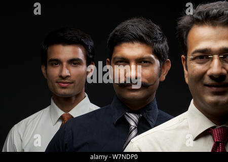 Portrait of business executives in a row Stock Photo