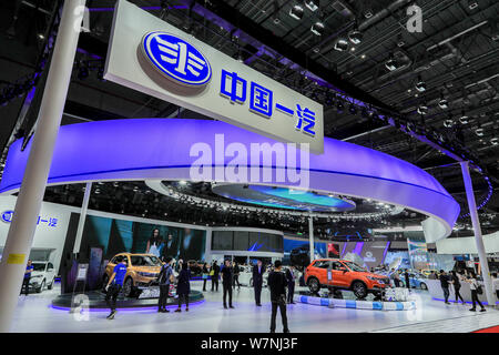 --FILE--People visit the stand of FAW Group Corporation during the 17th Shanghai International Automobile Industry Exhibition, also known as Auto Shan Stock Photo