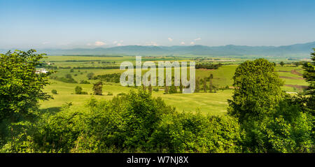 beautiful landscape of Turiec region in Slovakia from meadow bellow Blatnicky hrad castle ruins with meadows, fields, few villages and hills on the ba Stock Photo