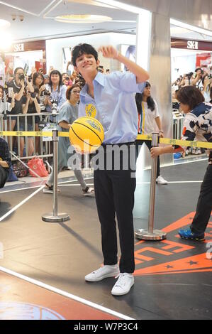 South Korea-based American singer Kim Samuel attends an autograph signing event at apm shopping mall in Hong Kong, China, 16 July 2017. Stock Photo