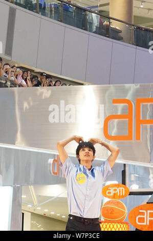 South Korea-based American singer Kim Samuel attends an autograph signing event at apm shopping mall in Hong Kong, China, 16 July 2017. Stock Photo