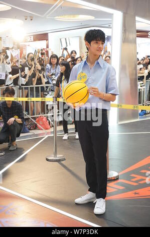 South Korea-based American singer Kim Samuel attends an autograph signing event at apm shopping mall in Hong Kong, China, 16 July 2017. Stock Photo