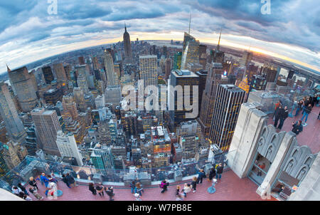 Wide angle Manhattan view towards Empire State Building at sunset from Top of the Rock, at Rockefeller Plaza, New York, USA 2011 Stock Photo