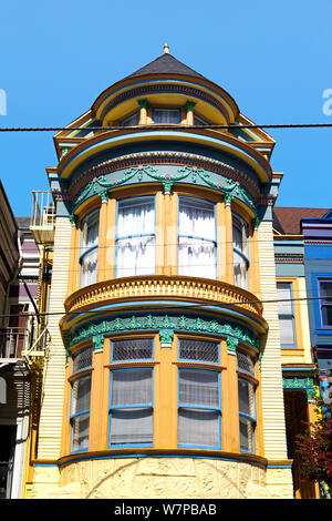 Colourfully painted Victorian houses in the Haight-Ashbury district of San Francisco, California, USA 2011 Stock Photo