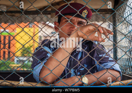 Portrait of a military guard sat in a sentry box in Kathmandu, Nepal. Stock Photo