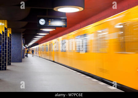 Moving train pulling into the station in new subway train station, Berlin, Germany 2009 Stock Photo