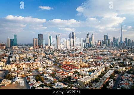 Elevated view of the new Dubai skyline of modern architecture and skyscrapers including the Burj Khalifa on Sheikh Zayed Road, Dubai, United Arab Emirates 2011 Stock Photo