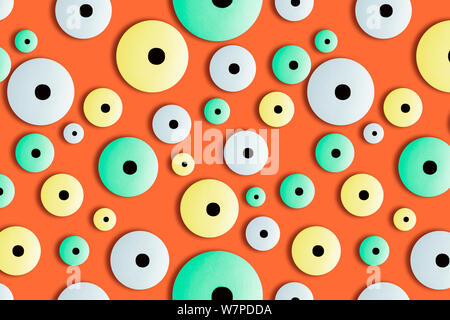 Modern creative seamless pattern of neon colors googly eyes candy on orange background.Photography collage.Funny children's treats.Halloween holiday Stock Photo