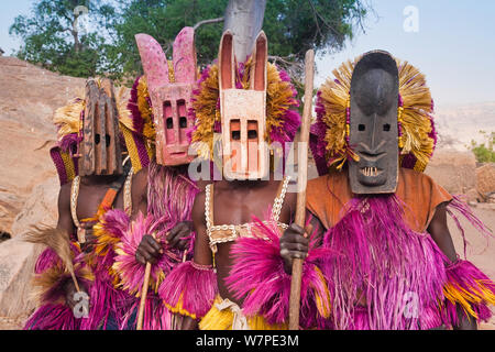 Traditional masked Ceremonial Dogon Dancers near Sangha, Bandiagara escarpment, Dogon Country, Mali, 2006 Stock Photo