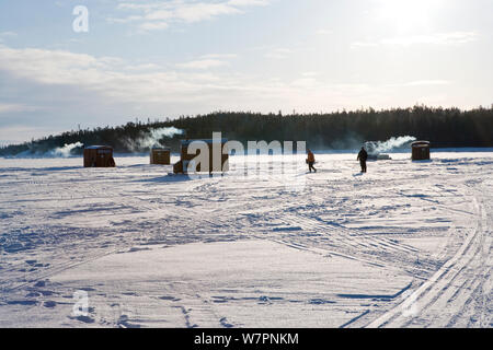 Wooden Cabins On Sledges Provide Shelter For Changing And Drying