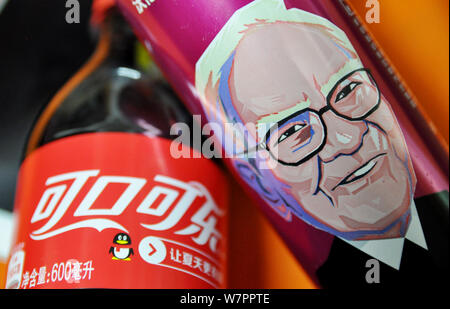 A can of Cherry Coca-Cola with a portrait of Warren Buffett, Chairman and CEO of Berkshire Hathaway, is pictured on the shelf with other soft drinks a Stock Photo