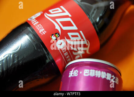 A can of Cherry Coca-Cola with a portrait of Warren Buffett, Chairman and CEO of Berkshire Hathaway, is pictured on the shelf with other soft drinks a Stock Photo