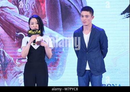 Chinese actress Zhou Xun, left, and Taiwanese actor Wallace Huo attend a premiere event for their new movie 'Our Time Will Come' in Beijing, China, 27 Stock Photo