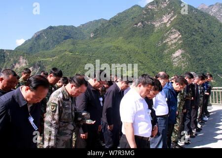 Chinese People Observe A Silence To Mourn For Victims At Xinmo Village  Devastated By The Landslide In Maoxian County, Tibetan And Qiang Autonomous  Pre Stock Photo - Alamy