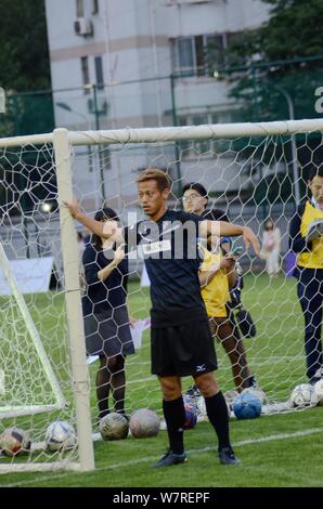Japanese football player Keisuke Honda of A.C. Milan is pictured during a youth football program in Shanghai, China, 15 June 2017. Stock Photo