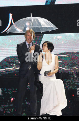 American director Michael Bay, left, attends a press conference for the premiere of his new movie 'Transformers: The Last Knight' in Guangzhou city, s Stock Photo