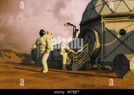 Mars station with astronauts, research habitat on the surface of the red planet Stock Photo
