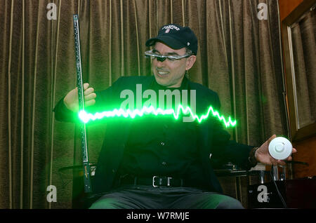 Canadian inventor Steve Mann, known as 'The Father of Wearable Computing', shows the SWIM (Sequential Wave Imprinting Machine) that makes otherwise in Stock Photo