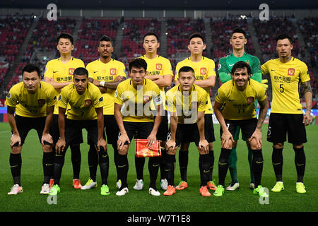 Players of the starting line-up of Chinau0027s Guangzhou Evergrande 