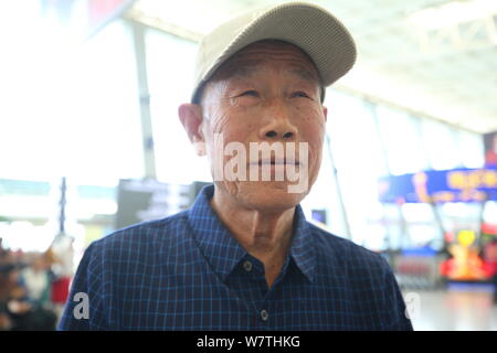 Chinese veteran soldier Wang Qi, who was unable to leave India for 54 years, is pictured at the Xi'an Xianyang International Airport before returning Stock Photo