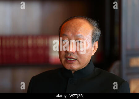 --FILE--Chen Feng, chairman and founder of the Chinese business conglomerate HNA Group and Hainan Airlines, attends an interview in Haikou city, south Stock Photo