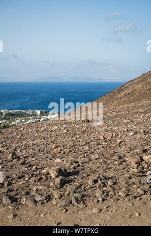 Fuerteventura and the sea from the Red Mountain in Lanzarote - Vertical landscape Stock Photo