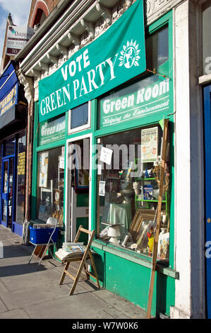 The Green Room, Green Party charity shop with banner saying Vote Green Party above, Archway Road, London Borough of Islington, England, UK, April 2008. Stock Photo