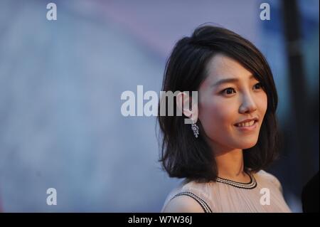 --FILE--Chinese actress Bai Baihe arrives on the red carpet for the premiere of her movie 'Monster Hunt' in Beijing, China, 5 July 2015.   A Chinese a Stock Photo