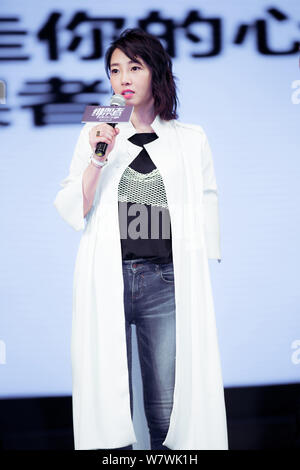 --FILE--Chinese actress Bai Baihe speaks at a press conference for her new movie 'The Missing...' in Guangzhou city, south China's Guangdong province, Stock Photo