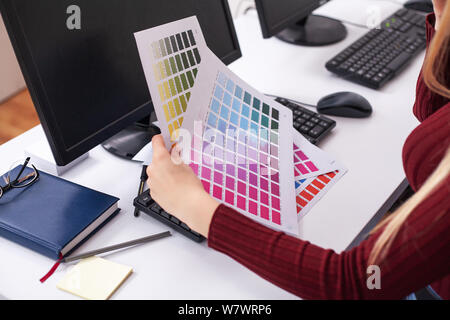 Woman Designer Working On Computer In Office on Modern Desktop Computer Stock Photo