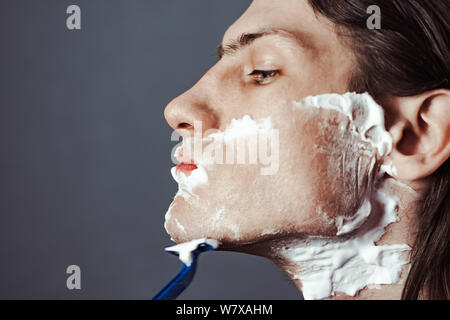 the guy with the long hair and the half-face beard. Stock Photo