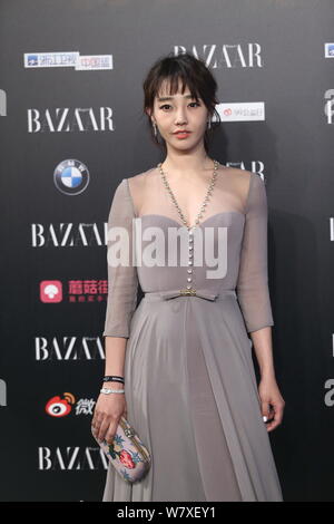 --FILE--Chinese actress Bai Baihe arrives on the red carpet for the 2016 Bazaar Star Charity Night gala in Beijing, China, 9 September 2016.   A Chine Stock Photo