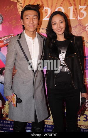 --FILE--Chinese actress Bai Baihe, right, and her singer husband Chen Yufan of Chinese pop duet Yuquan (Yu Quan) arrive on the red carpet for the prem Stock Photo