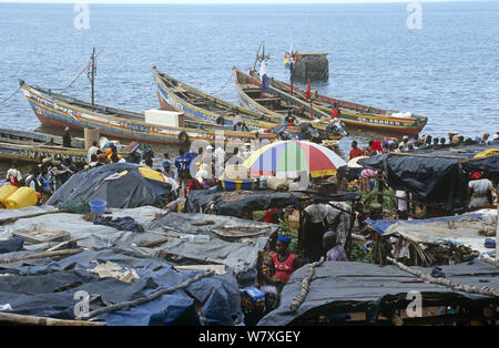 Boats and stalls in Big Wharf harbour, Freetown, Sierra Leone, 2004-2005. Stock Photo