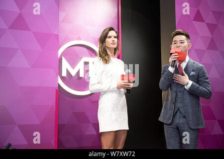 Brazilian model Alessandra Ambrosio, left, attends an unveiling ceremony of her own wax figure at the Madame Tussauds wax museum in Shanghai, China, 6 Stock Photo