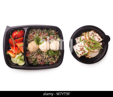 Meat balls with buckwheat and vegetables in delivery boxes Stock Photo