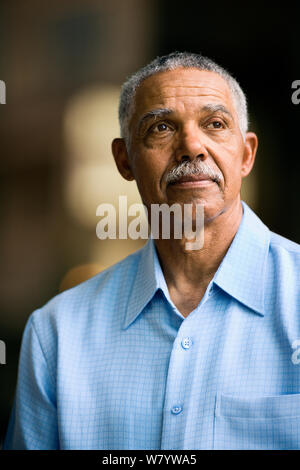 Mature man looking into the distance. Stock Photo
