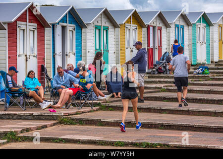 Bude, North Cornwall, England. Wednesday 7th August 2019. UK Weather. Despite the intermittent downpours, holidaymakers make the most of the occaional spells of sunshine in Bude North Cornwall. Credit: Terry Mathews/Alamy Live News Stock Photo