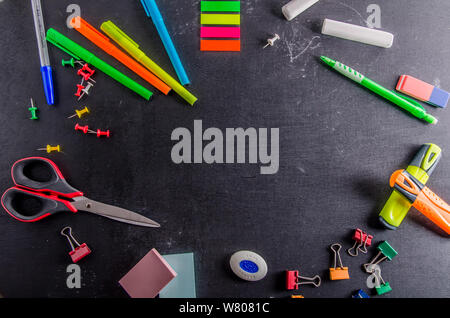stationery on a black background back to school with copy space Stock Photo